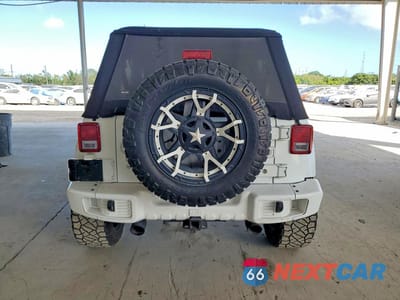 Zdjęcie 6 z 13 samochodu: 2013 JEEP WRANGLER UNLIMITED SAHARA VIN:1C4BJWEG1DL613053 - miniatura