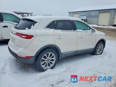 Trzecie zdjęcie samochodu z tyłu: 2017 LINCOLN MKC SELECT VIN:5LMCJ2D92HUL04300 - miniatura