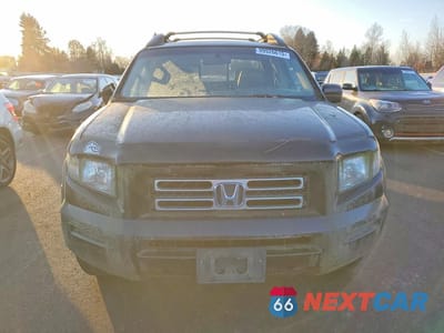 Piąte zdjęcie samochodu w środku: 2006 HONDA RIDGELINE RTL VIN:2HJYK16516H549213 - miniatura