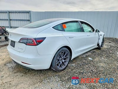 Trzecie zdjęcie samochodu z tyłu: 2019 TESLA MODEL 3 VIN:5YJ3E1EB3KF452916 - miniatura