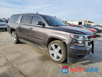 Czwarte zdjęcie samochodu z boku: 2016 CHEVROLET SUBURBAN C1500 LT VIN:1GNSCHKC0GR372358 - miniatura