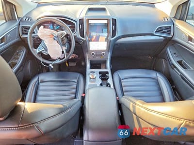 Zdjęcie 8 z 12 samochodu: 2021 FORD EDGE SEL VIN:2FMPK3J92MBA11511 - miniatura