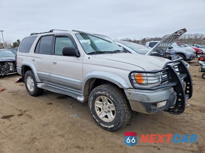 Czwarte zdjęcie samochodu z boku: 1999 TOYOTA 4RUNNER LIMITED VIN:JT3HN87R9X9028154 - miniatura