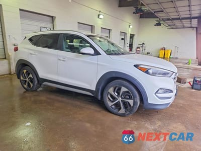 Czwarte zdjęcie samochodu z boku: 2017 HYUNDAI TUCSON LIMITED VIN:KM8J3CA22HU464825 - miniatura