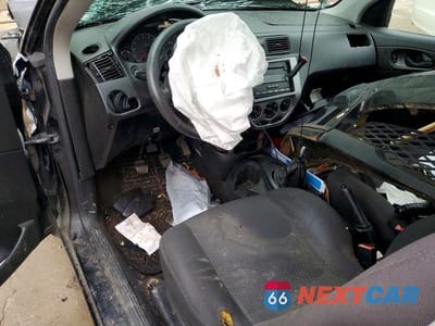 Zdjęcie 8 z 11 samochodu: 2006 FORD FOCUS ZX3 VIN:1FAFP31NX6W227614 - miniatura