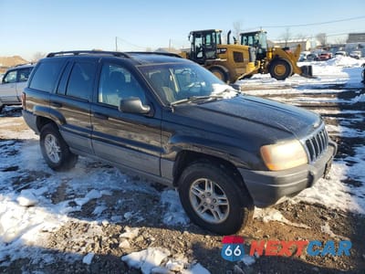 Czwarte zdjęcie samochodu z boku: 2002 JEEP GRAND CHEROKEE LAREDO VIN:1J4GW48S82C178860 - miniatura