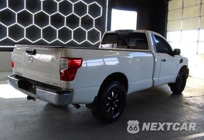 Trzecie zdjęcie samochodu z tyłu: 2017 NISSAN TITAN SV VIN:1N6AA1R87HN548279 - miniatura