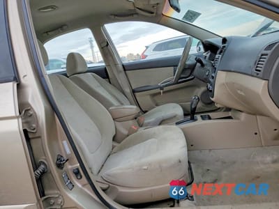 Zdjęcie 7 z 13 samochodu: 2004 KIA SPECTRA LX VIN:KNAFE121345058584 - miniatura