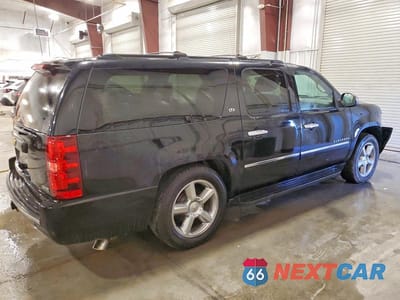 Trzecie zdjęcie samochodu z tyłu: 2012 CHEVROLET SUBURBAN K1500 LTZ VIN:1GNSKKE7XCR110985 - miniatura