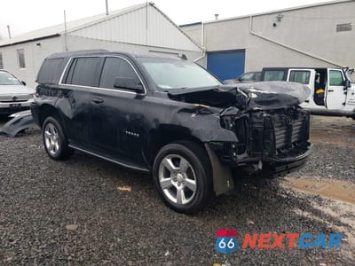 Czwarte zdjęcie samochodu z boku: 2019 CHEVROLET TAHOE K1500 LT VIN:1GNSKBKC8KR106742 - miniatura