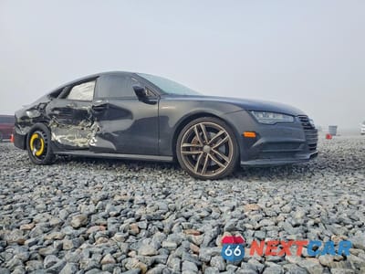 Czwarte zdjęcie samochodu z boku: 2016 AUDI A7 PREMIUM PLUS VIN:WAUWGAFC6GN035715 - miniatura