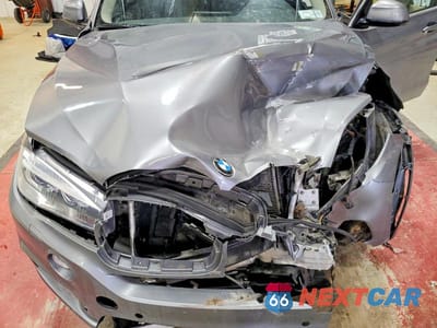 Zdjęcie 12 z 13 samochodu: 2014 BMW X5 XDRIVE35I VIN:5UXKR0C56E0C27952 - miniatura