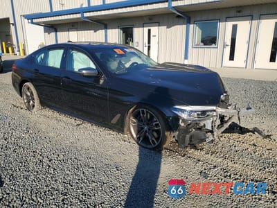 Czwarte zdjęcie samochodu z boku: 2020 BMW M550XI VIN:WBAJS7C06LCD00163 - miniatura