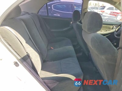 Zdjęcie 10 z 11 samochodu: 2003 TOYOTA COROLLA CE VIN:1NXBR32E93Z024136 - miniatura