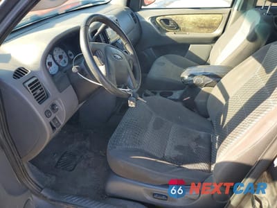 Zdjęcie 7 z 14 samochodu: 2003 FORD ESCAPE XLT VIN:1FMYU031X3KB12997 - miniatura