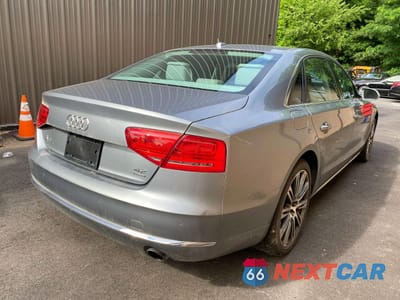 Czwarte zdjęcie samochodu z boku: 2011 AUDI A8 L QUATTRO VIN:WAURVAFD7BN018734 - miniatura