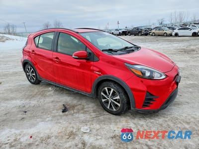 Czwarte zdjęcie samochodu z boku: 2018 TOYOTA PRIUS C VIN:JTDKDTB34J1602272 - miniatura