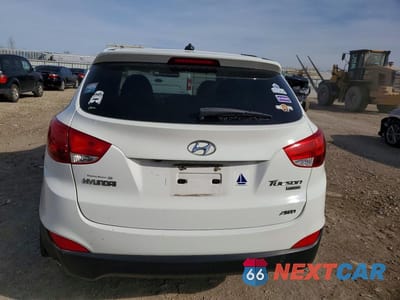 Zdjęcie 6 z 13 samochodu: 2013 HYUNDAI TUCSON VIN:KM8JUCAC4DU663570 - miniatura