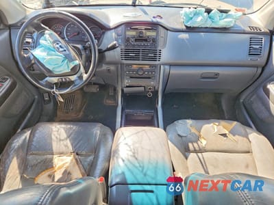 Zdjęcie 8 z 14 samochodu: 2003 HONDA PILOT EXL VIN:2HKYF18663H513972 - miniatura