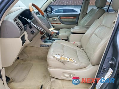 Zdjęcie 7 z 13 samochodu: 2004 LEXUS LX 470 BASE VIN:JTJHT00W543537835 - miniatura