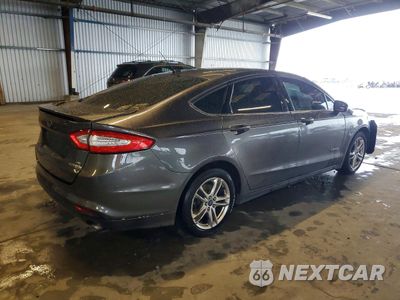 Trzecie zdjęcie samochodu z tyłu: 2016 FORD FUSION SE HYBRID VIN:3FA6P0LU5GR157608 - miniatura