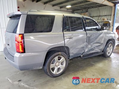 Trzecie zdjęcie samochodu z tyłu: 2019 CHEVROLET TAHOE C1500 LT VIN:1GNSCBKC3KR149981 - miniatura
