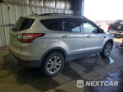 Trzecie zdjęcie samochodu z tyłu: 2018 FORD ESCAPE SE VIN:1FMCU9GD1JUB68718 - miniatura