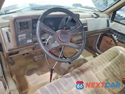 Zdjęcie 8 z 12 samochodu: 1992 GMC SIERRA K1500 VIN:1GTEK14K8NZ524260 - miniatura