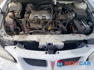 Zdjęcie 11 z 12 samochodu: 1999 PONTIAC GRAND AM SE VIN:1G2NE52E2XC508402 - miniatura