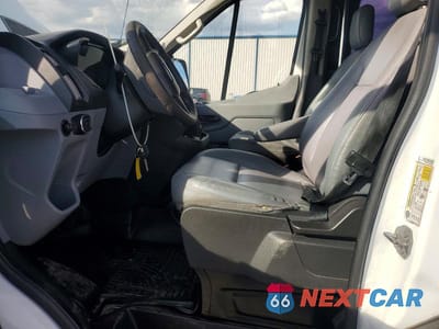 Zdjęcie 7 z 12 samochodu: 2018 FORD TRANSIT T-150 VIN:1FTYE1CM1JKA59699 - miniatura