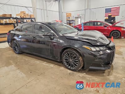 Czwarte zdjęcie samochodu z boku: 2021 TOYOTA AVALON HYBRID XSE VIN:4T1EA1ABXMU003345 - miniatura