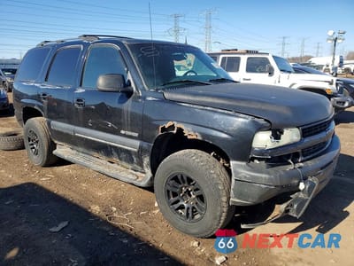 Czwarte zdjęcie samochodu z boku: 2002 CHEVROLET TAHOE K1500 VIN:1GNEK13Z62J155057 - miniatura