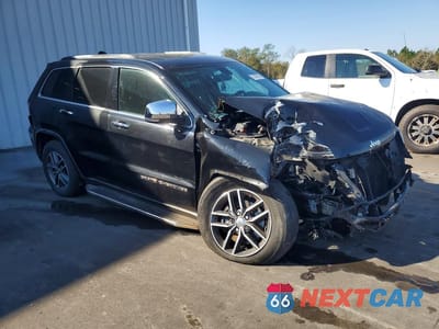 Czwarte zdjęcie samochodu z boku: 2017 JEEP GRAND CHEROKEE LIMITED VIN:1C4RJFBG4HC807715 - miniatura