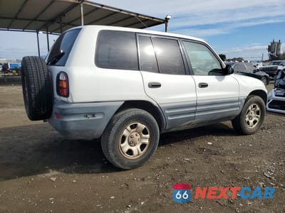 Trzecie zdjęcie samochodu z tyłu: 1998 TOYOTA RAV4 VIN:JT3GP10V6W0023324 - miniatura