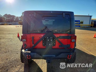 Zdjęcie 6 z 12 samochodu: 2016 JEEP WRANGLER UNLIMITED SPORT VIN:1C4BJWDG7GL148719 - miniatura