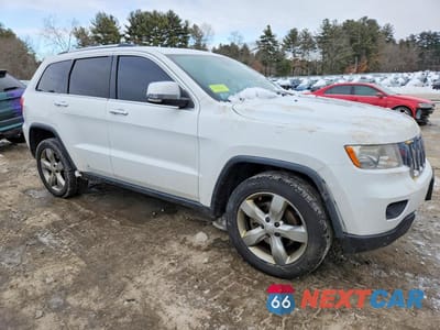 Czwarte zdjęcie samochodu z boku: 2013 JEEP GRAND CHEROKEE OVERLAND VIN:1C4RJFCT7DC615534 - miniatura