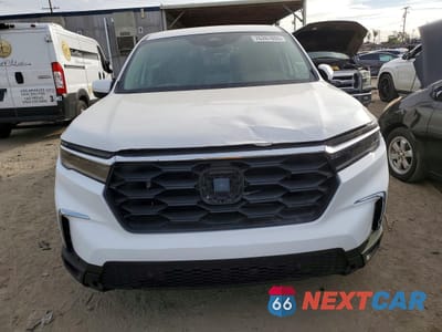 Piąte zdjęcie samochodu w środku: 2025 HONDA PILOT EXL VIN:5FNYG1H4XSB106939 - miniatura
