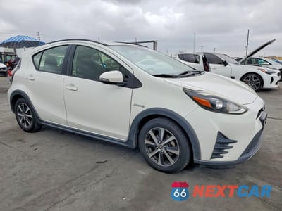 Czwarte zdjęcie samochodu z boku: 2018 TOYOTA PRIUS C VIN:JTDKDTB38J1606258 - miniatura