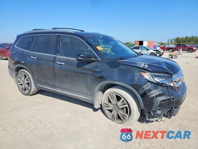 Czwarte zdjęcie samochodu z boku: 2022 HONDA PILOT TOURING VIN:5FNYF5H90NB015415 - miniatura