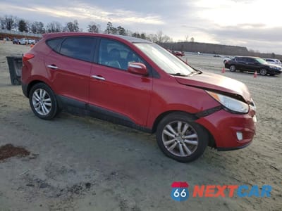 Czwarte zdjęcie samochodu z boku: 2011 HYUNDAI TUCSON GLS VIN:KM8JUCAC5BU281593 - miniatura
