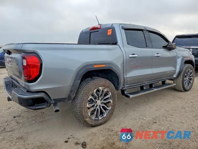 Trzecie zdjęcie samochodu z tyłu: 2026 GMC CANYON DENALI VIN:1GTP2FEK6T1114945 - miniatura