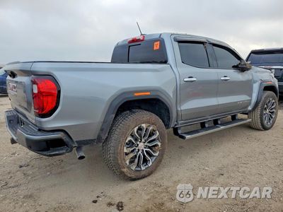 Trzecie zdjęcie samochodu z tyłu: 2026 GMC CANYON DENALI VIN:1GTP2FEK6T1114945 - miniatura