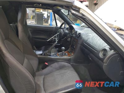 Zdjęcie 10 z 12 samochodu: 2003 MAZDA MX-5 MIATA BASE VIN:JM1NB353X30304462 - miniatura