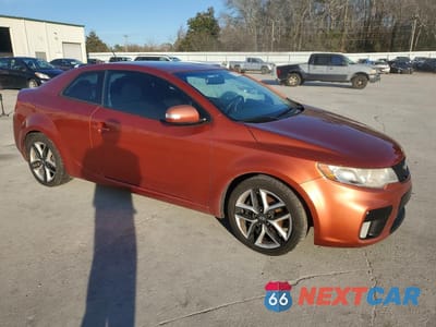 Czwarte zdjęcie samochodu z boku: 2010 KIA FORTE KOUP SX VIN:KNAFW6A36A5175343 - miniatura