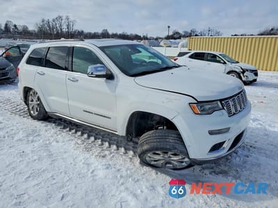 Czwarte zdjęcie samochodu z boku: 2019 JEEP GRAND CHEROKEE SUMMIT VIN:1C4RJFJT8KC774935 - miniatura