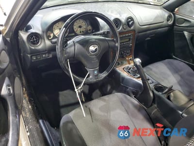 Zdjęcie 8 z 12 samochodu: 2003 MAZDA MX-5 MIATA BASE VIN:JM1NB353X30304462 - miniatura