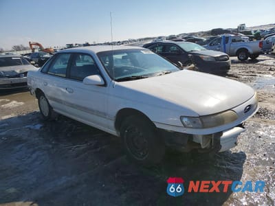 Czwarte zdjęcie samochodu z boku: 1994 FORD TAURUS GL VIN:1FALP52U3RA282220 - miniatura