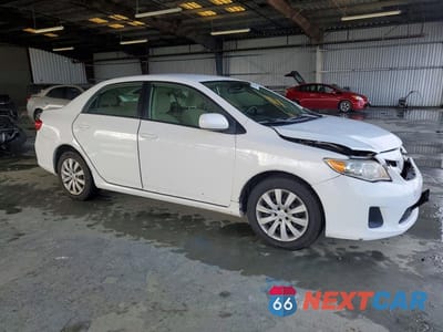 Czwarte zdjęcie samochodu z boku: 2012 TOYOTA COROLLA BASE VIN:JTDBU4EE6C9175071 - miniatura