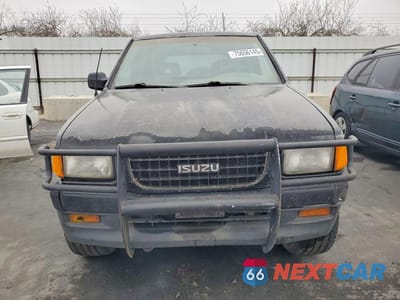 Piąte zdjęcie samochodu w środku: 1997 ISUZU RODEO VIN:4S2CM58V0V4302679 - miniatura