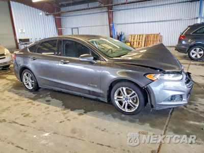Czwarte zdjęcie samochodu z boku: 2016 FORD FUSION SE HYBRID VIN:3FA6P0LU5GR157608 - miniatura